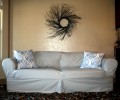 Tailored Square Cushion slipcover with accent pillows.